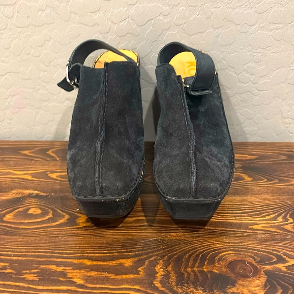 Black Michael Kors leather buckle closed heels in mid condition